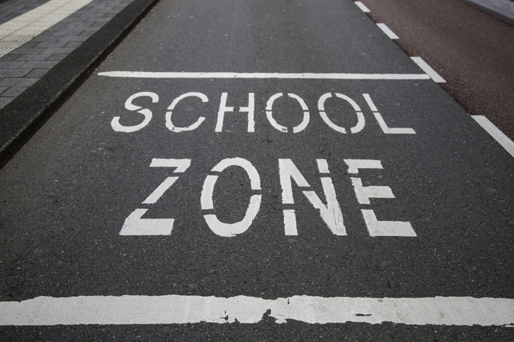 School signal on the asphalt